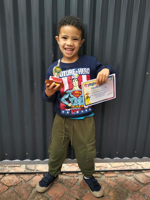 Gaby and Zeek boast playball trophies